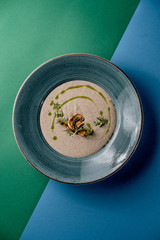 Soup mushroom cream olive oil restaurant cafe dish traditional top