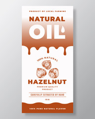 Natural Oil Abstract Vector Packaging Design or Label Template. Modern Typography, Gradient Drips and Hand Drawn Hazelnut nuts Sketch Silhouette Background Layout.