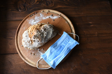 homemade bread with sesame seeds. cook in the kitchen at home during the coronavirus crisis. Stay at home. Enjoy cooking at home. Wholemeal bread. Healthy bread