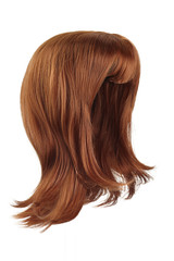 Subject shot of a natural looking ginger wig with bangs. The shoulder-long wig with twisted strands is isolated on the white background. 