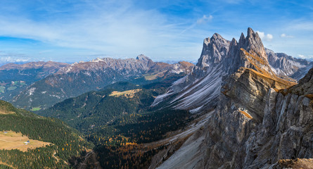 Picturesque autumn Alps mountain scene, famous italian Dolomites Seceda majestic rock, Sass Rigais, Sudtirol, Italy. Beautiful traveling, seasonal and nature beauty concept scene.
