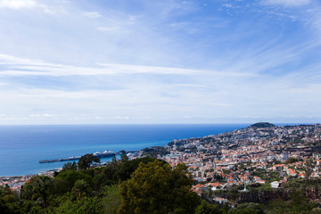Naklejka na ściany i meble Distant view at town Funchal on Madeira island, Portugal