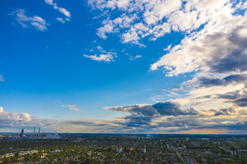 Aerial view from drone. Aerial view amazing sunset over of the suburbs with the city, far villages and fields