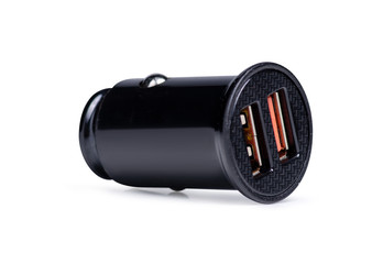 Car USB power supply in the cigarette lighter on a white background isolation