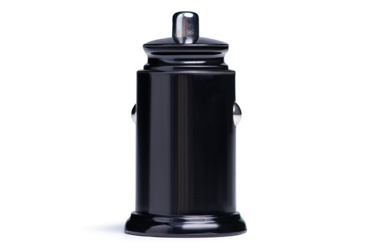 Car USB power supply in the cigarette lighter on a white background isolation