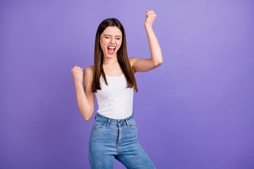 Fototapeta na wymiar Portrait of delighted lucky girl have lottery celebration win raise fists scream yeah wear good look clothes isolated over purple color background
