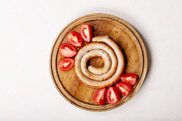 Snail sausage in traditional spiral