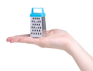 Blue mini grater in hand on white background isolation