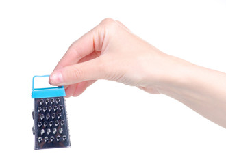 Blue mini grater in hand on white background isolation