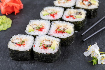 Sushi roll sushi with prawn, avocado, cream cheese, sesame. Sushi menu. Japanese food.