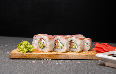Rolls with ham, cheese and vegetables. Wood surface. Photo for the menu