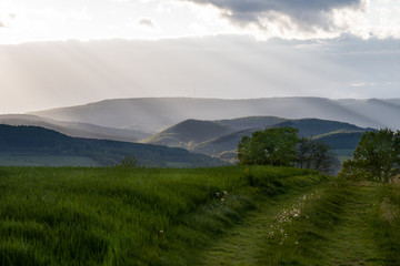 Fototapeta premium Mountainview in the middle of germany cloudy sky sunray