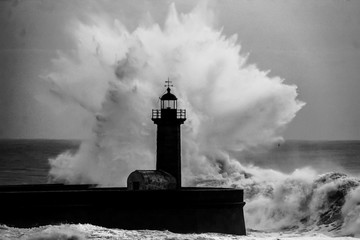 Entry of Douro River harbor on big stormy waves