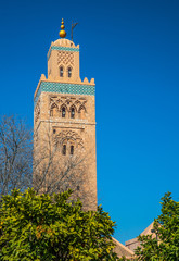 Fototapeta premium view of Koutoubia Mosque (Kutubiyya or Jami' al-Kutubiyah Mosque) the largest mosque located in the medina quarter of Marrakesh, Morocco