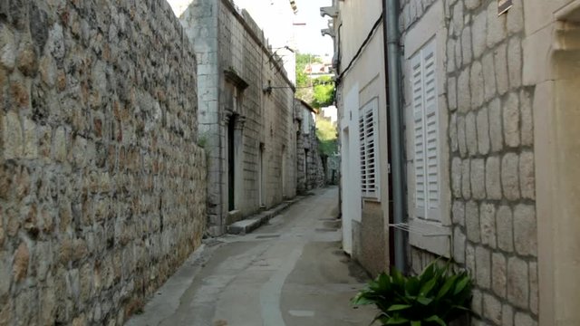 Moving through old stone ally way in Croatia