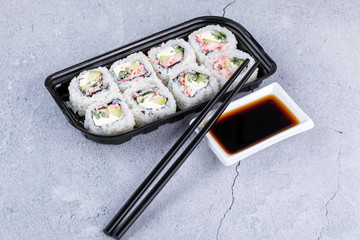 Sushi roll sushi with prawn, avocado, cream cheese, sesame. Sushi menu. Japanese food.