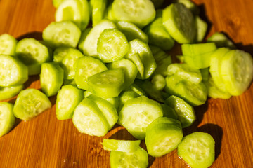Tray with cucumbers cut into a buffet