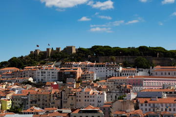 A view of a Lisbon skyline and dense old city center in late summer as seen from the top of a tower, Portugal.