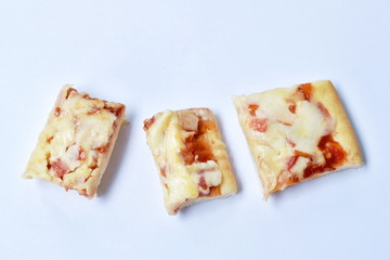 piece of pizza topping sausage and cheese on white background
