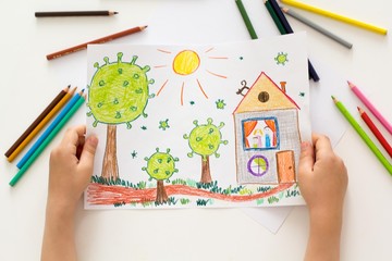 little boy draws a virus