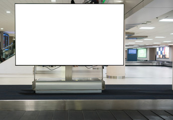 Blank advertising billboard at conveyor belt luggage in airportat airport. Copy space for cutomer text information advertise about tourism transport business etc.