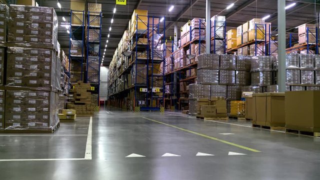 Tall Shelves inside Modern Packaging Warehouse / Timelapse