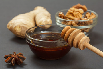 Health remedy foods for cold and flu relief on a black background.