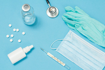 Latex gloves, a mask, mercury thermometer and pills for personal protection.