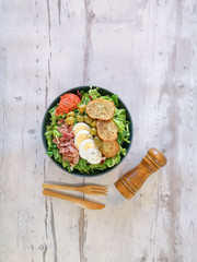 Fresh salad - Delicious fresh salad with tomatoes, lettuce, eggplant, zucchini, cheese, parma ham and olive oil.
