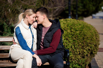 Fototapeta premium Beautiful young couple in love walks in the park.