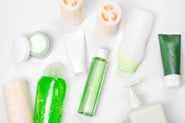 Cosmetic containers, blank label package for branding mock-up. Moisturizing cream, liquid soap or shampoo, tonic, face and body skin care. Natural green organic beauty products.