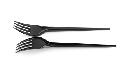 Black plastic fork isolated on white background.