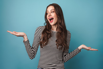 Image of joyful caucasian woman smiling and holding copyspace