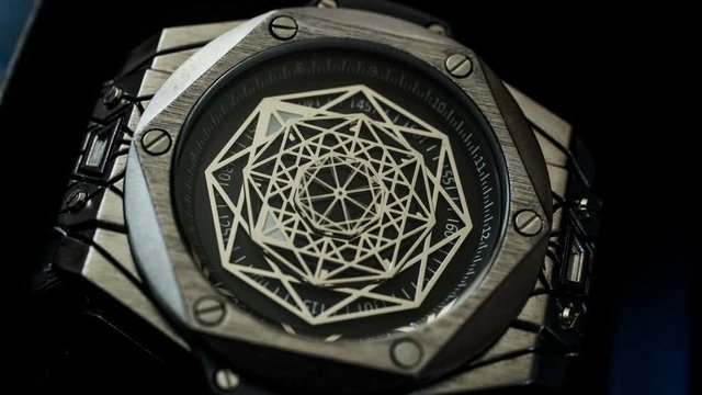 Antique watch mechanism gears running in timelapse 4k extreme macro closeup