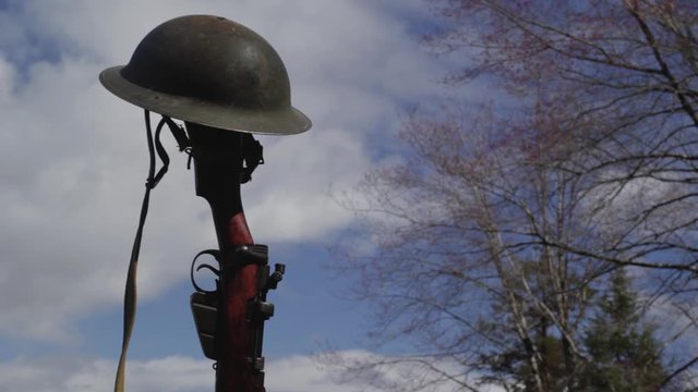 World war era rifle and Brodie helmet time lapse