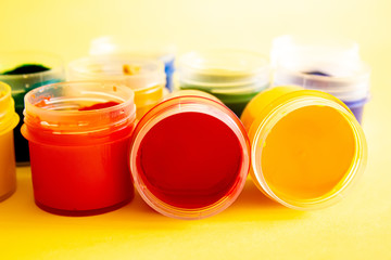 Set of 10 colors of gouache in plastic jars.selectiv focus