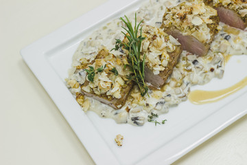 a restaurant dish prepared by a chef for special occasions: weddings, parties, birthdays and just a good dinner. Meat with sauce.
