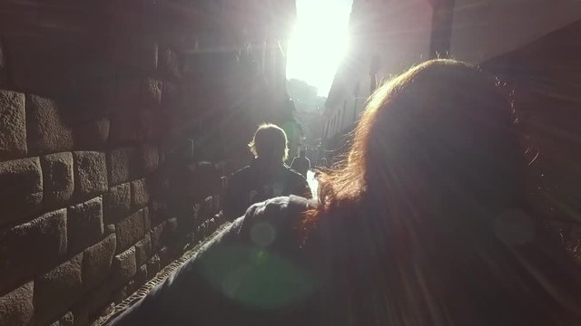 Group of people walking in street of Cusco Peru