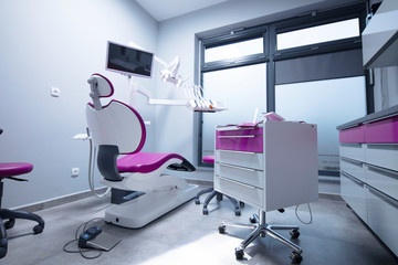 Naklejka premium Modern dental practice. Dental chair and other accessories used by dentists.