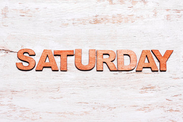 Word saturday made of wood letters