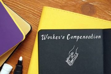 Business concept about Workers Compensation with phrase on the sheet.