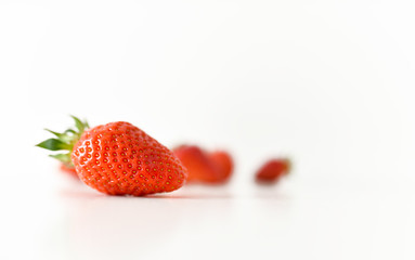 fresh strawberries bright red new crop on a white background