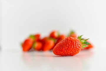 fresh strawberries bright red new crop on a white background