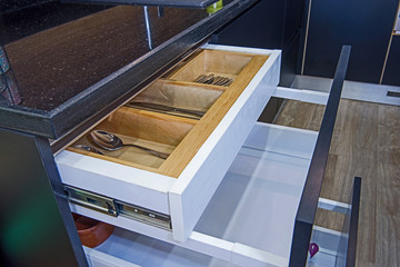 Kitchen interior design sliding cutlery drawer detail