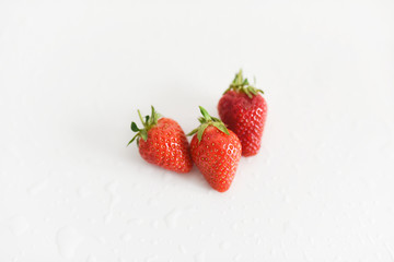 fresh strawberries bright red new crop on a white background