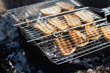 White bread toasted on an outdoor grill. Barbecue Picnic.Outdoor barbecue.