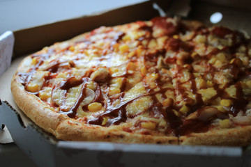 Pizza in a paper box