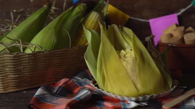Brazilian typical "pamonha", corn cob and pacoca" june party "festa junina" slider horizontal 4k