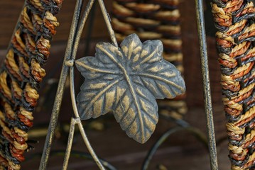 one iron brown forged leaf in metal decoration