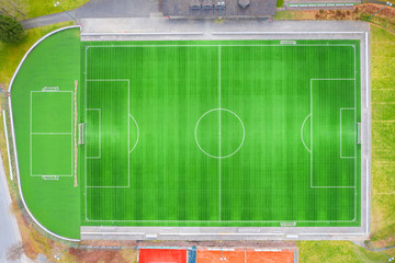 a green empty soccer field from above